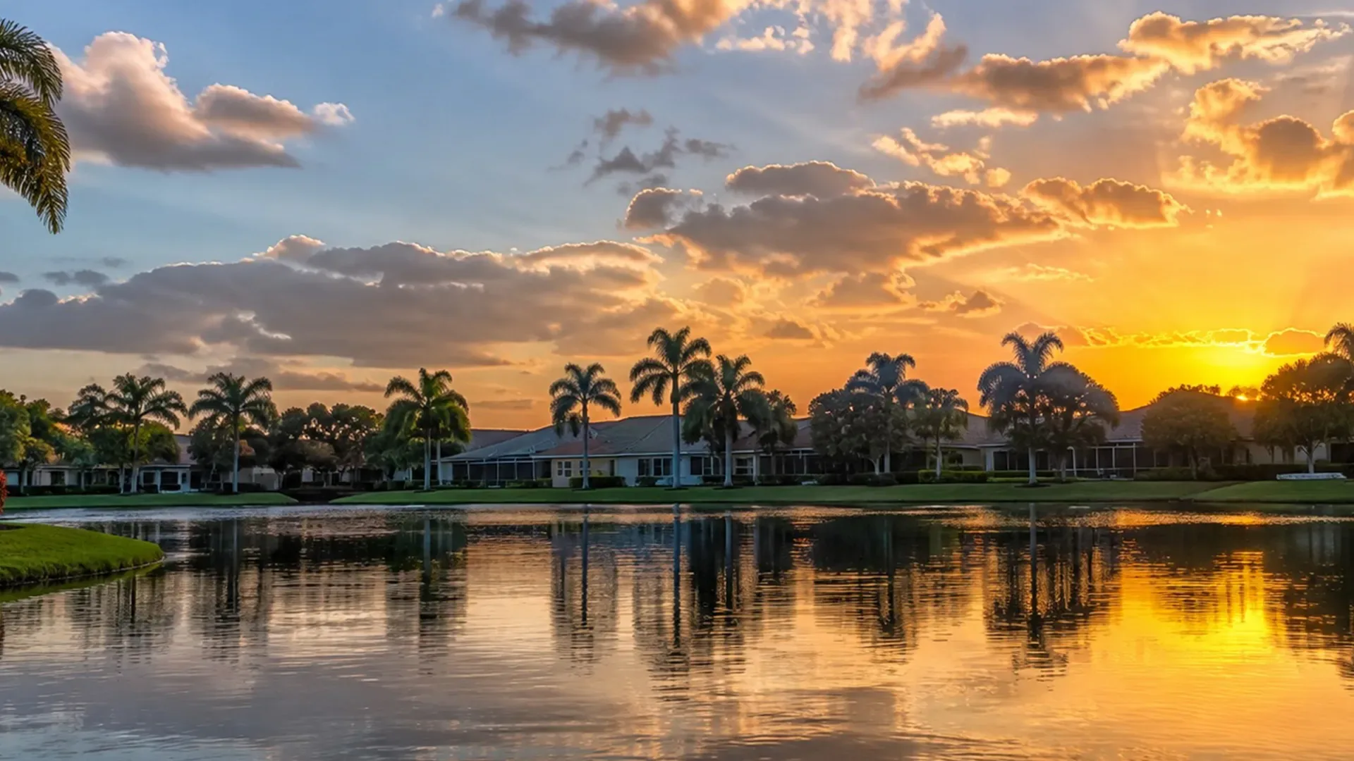 Residential neighborhood in Plantation, Florida with palm trees and waterfront homes